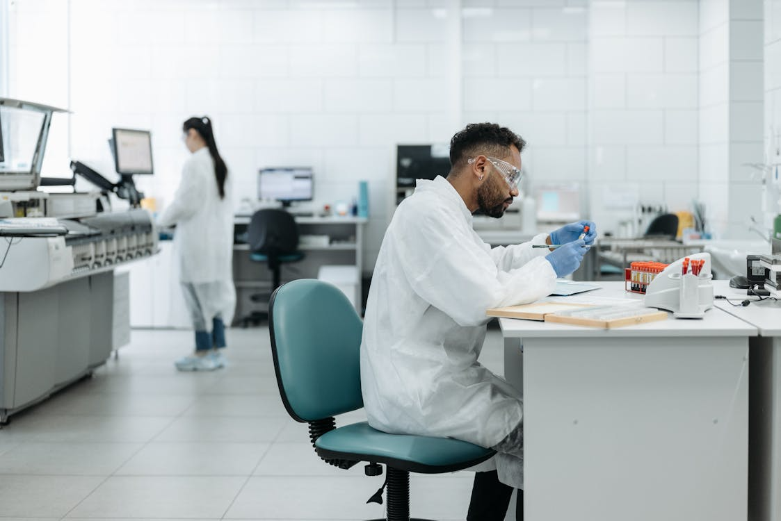 Scientist working with samples in a high-tech biotechnology lab, representing the rise of biotech startups.