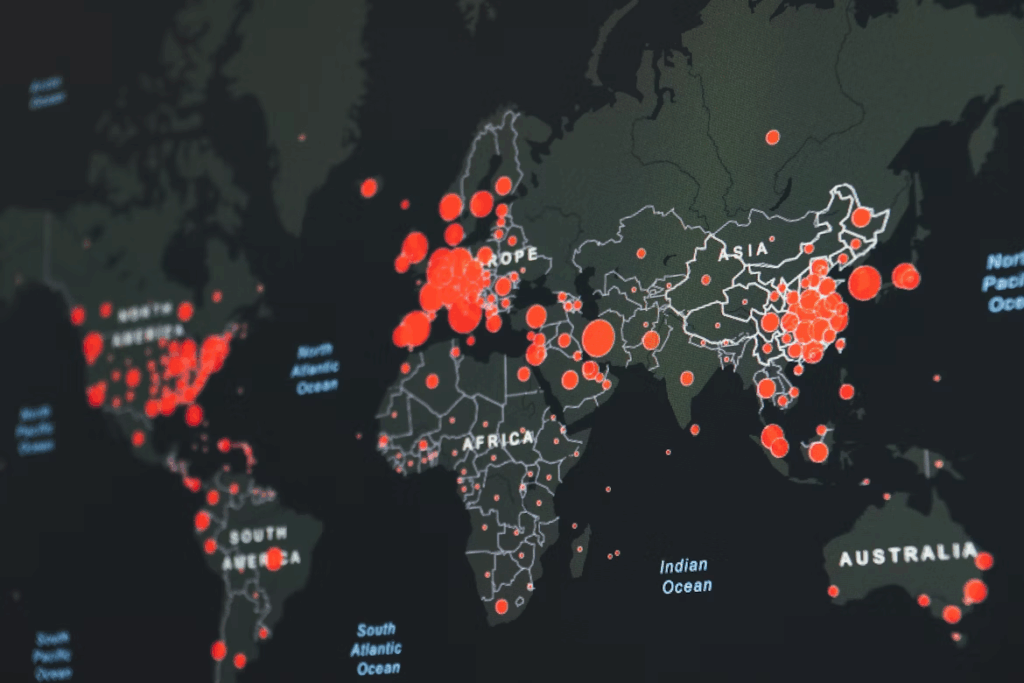 Digital world map showing clusters of red markers representing global cybersecurity threats.